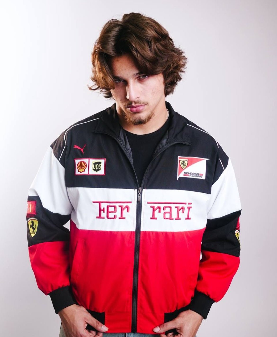 Model wearing oversized unisex Ferrari F1 White Racer Jacket
